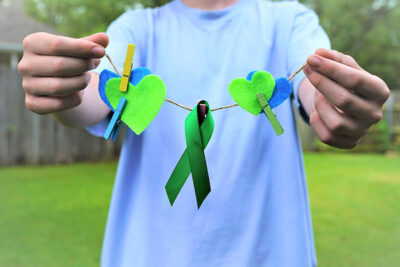 Green Ribbon Symbolizing Lymphatic Awareness
